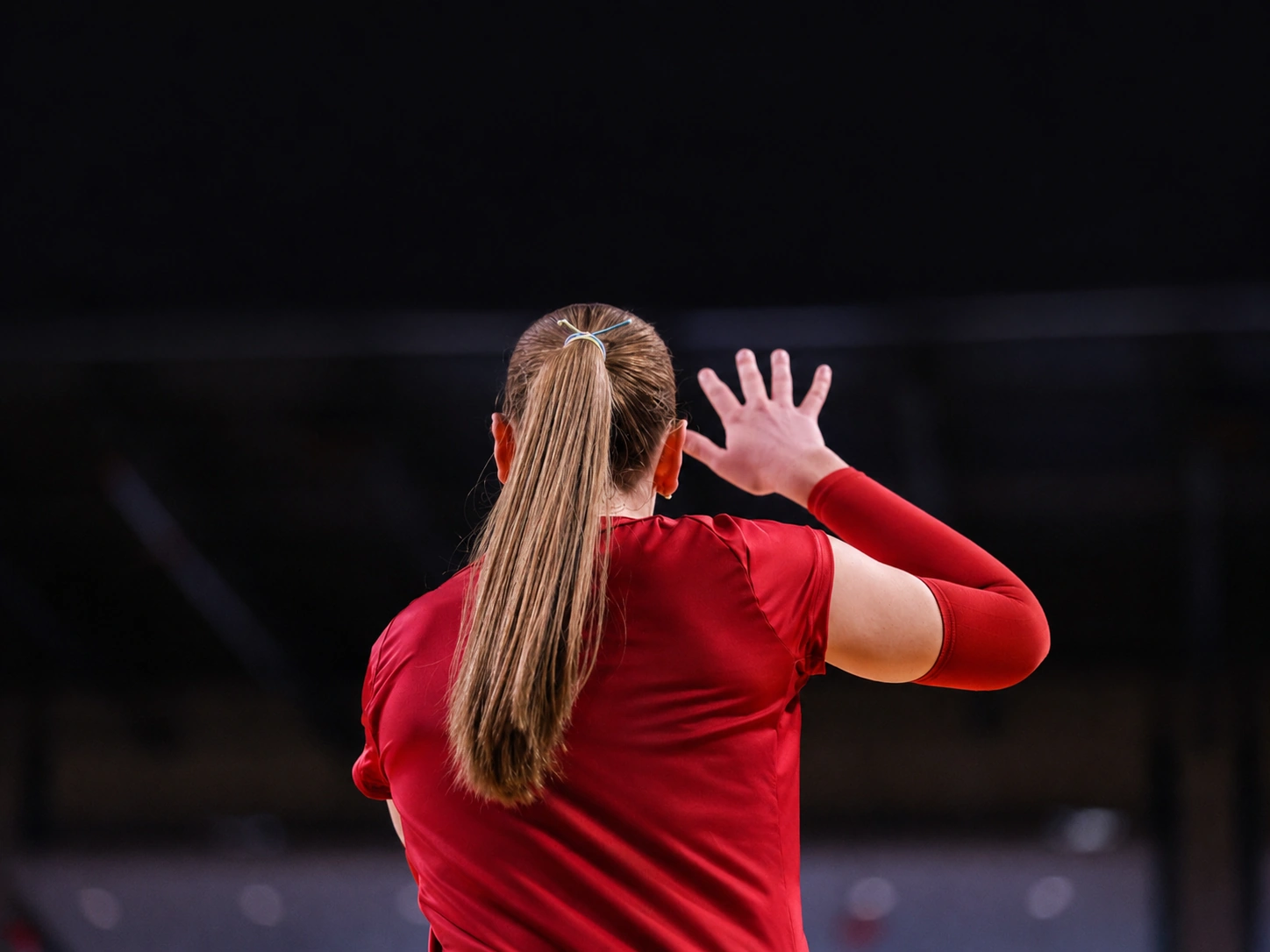 Rebecca Ring preparing to serve during a match